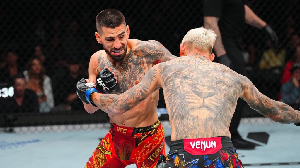 Ilia Topuria nocauteou brutalmente Charles Oliveira, no primeiro round, e conquistou o cinturão peso leve do UFC