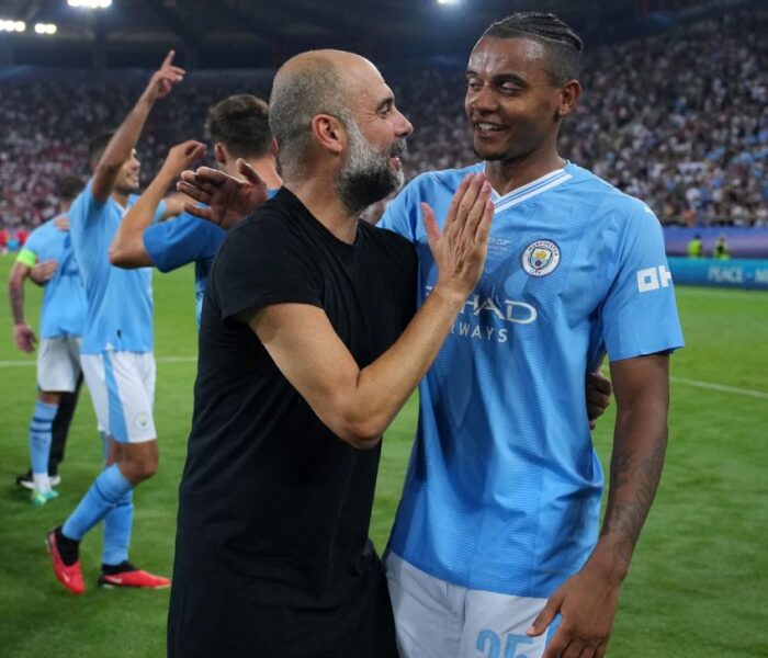 Akanji, Guardiola, Manchester City