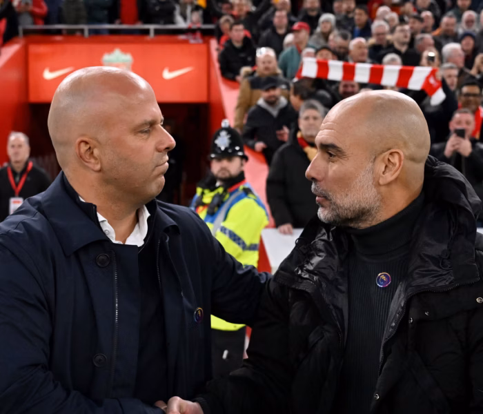 guardiola e slot manchester city e liverpool premier league