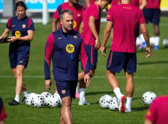 Hansi Flick e jogadores do Barcelona