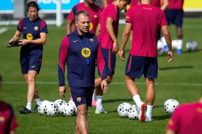 Hansi Flick e jogadores do Barcelona